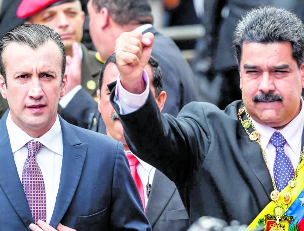 El hoy ministro de Petróleo, Tareck El Aissami (izq.), es señalado de abrirle a Hezbolá las puertas de Venezuela. El régimen de Nicolás Maduro mantiene estrecha relación e intercambios con Irán.