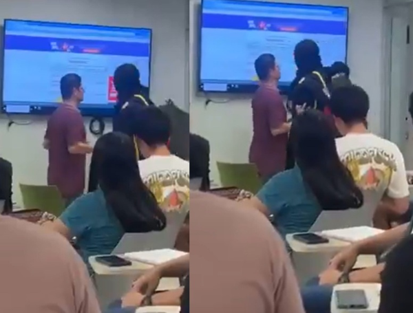 Encapuchads y docente de la UIS