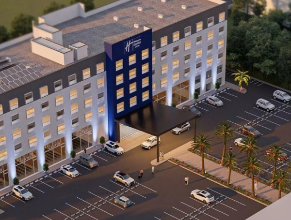 La gobernadora del Valle, Dilian Francisca Toro, con directivas de Invest Pacific, la cadena hotelera y dirigentes gremiales de la región.