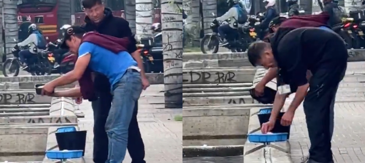 Hombres Lavando Pollo en El Canal San Francisco
