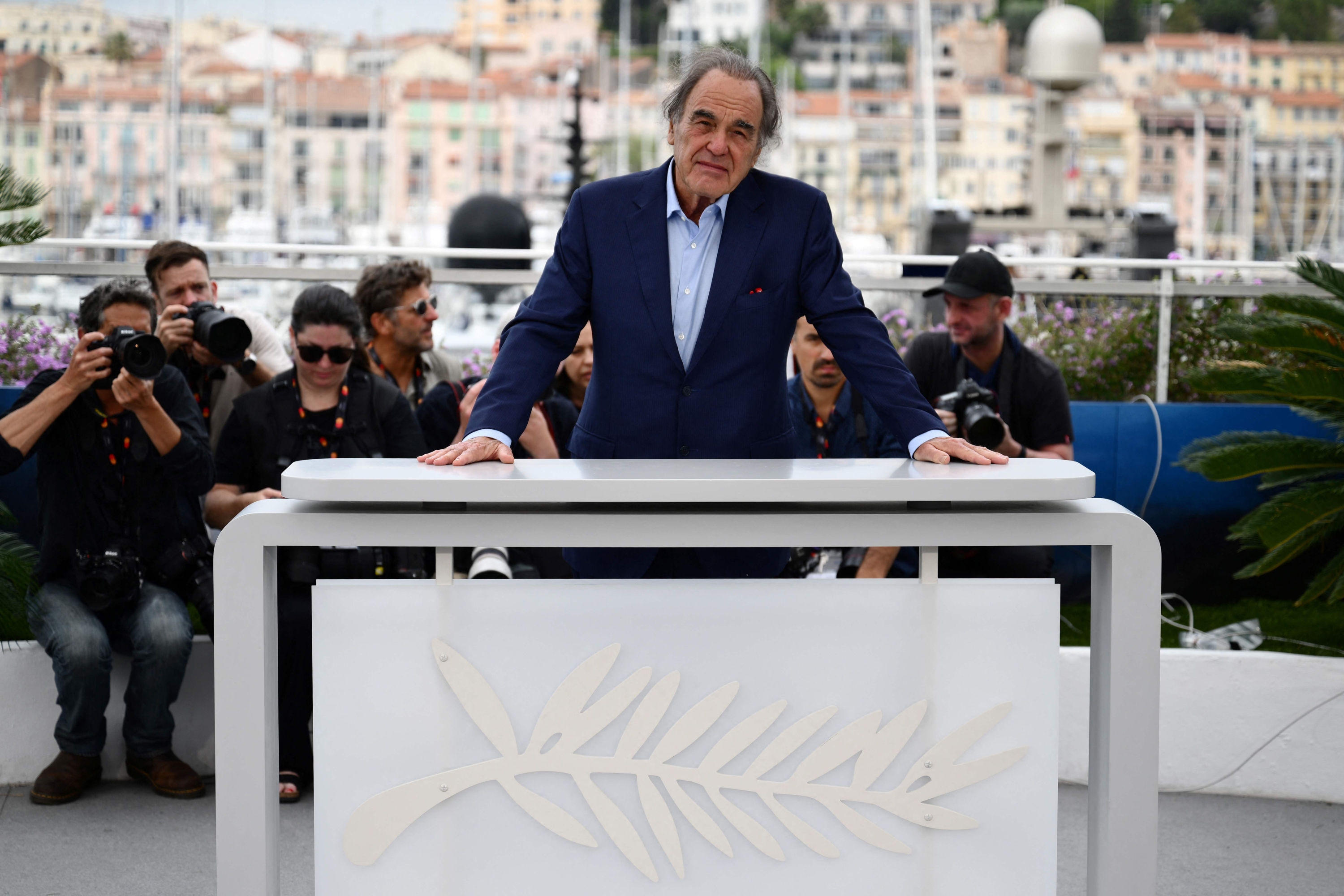 US director Oliver Stone poses during a photocall for the film 