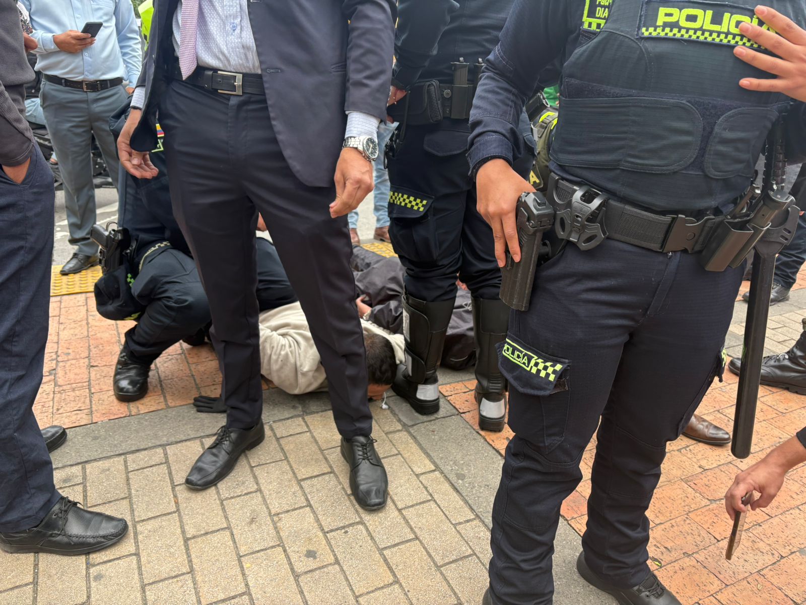 One of the alleged thieves captured.